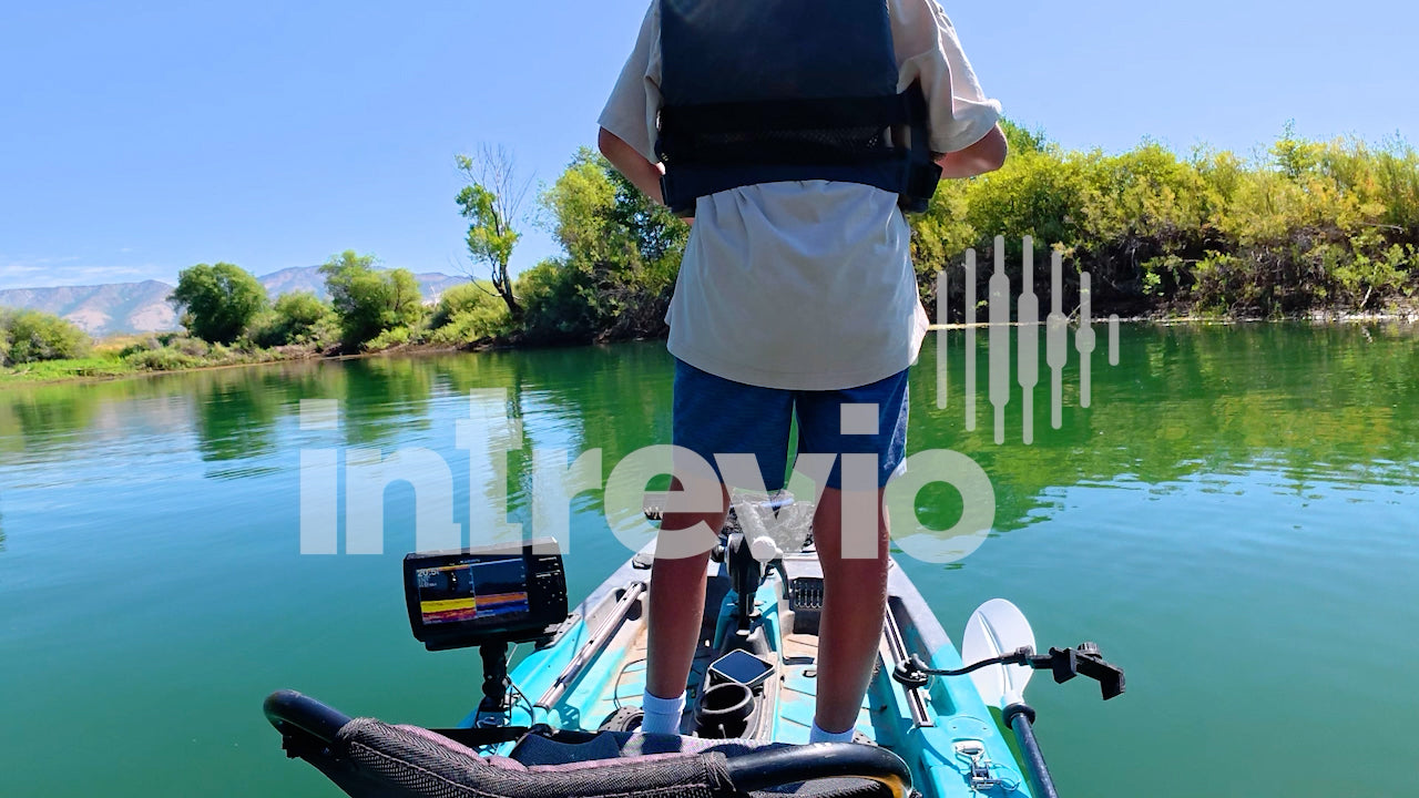 Catching Smallmouth Bass Standing in Kayak OTS-1