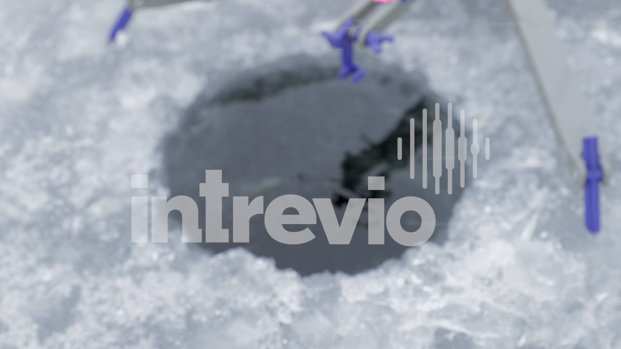 Dropping Lure into Ice Fishing Hole-01