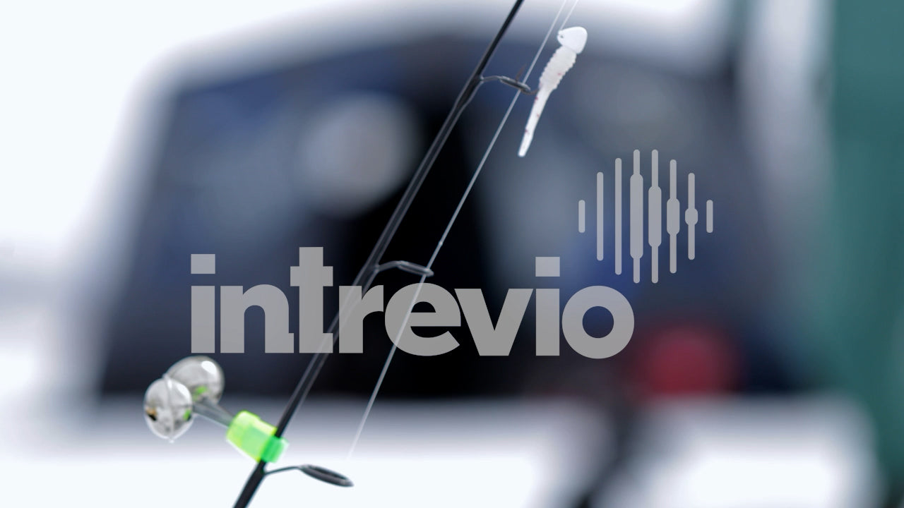 Ice Fishing Pole Fisherman Walks Over and Picks Up