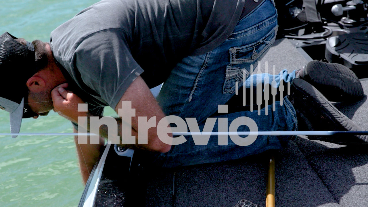 Landing Smallmouth Bass onto Boat