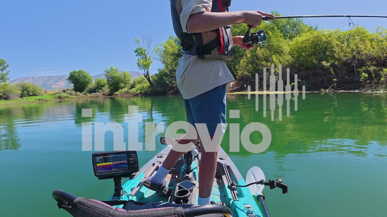 Catching Smallmouth Bass Standing in Kayak OTS-2