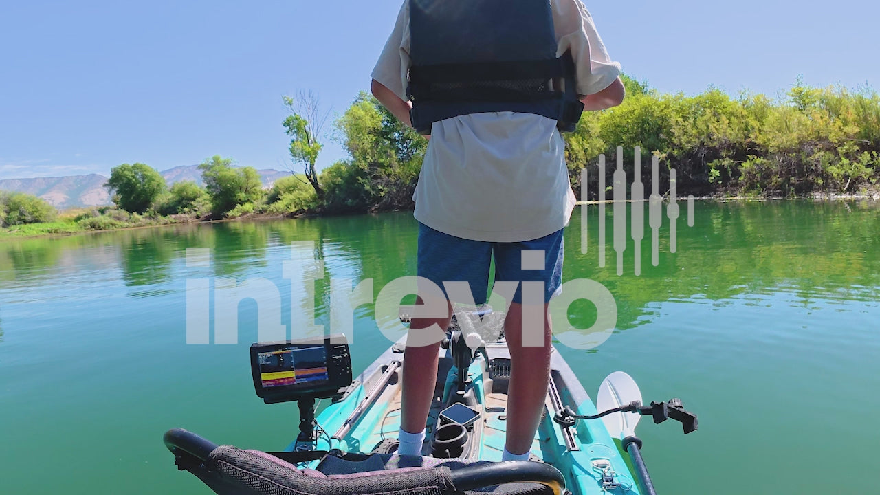 Catching Smallmouth Bass Standing in Kayak OTS-1