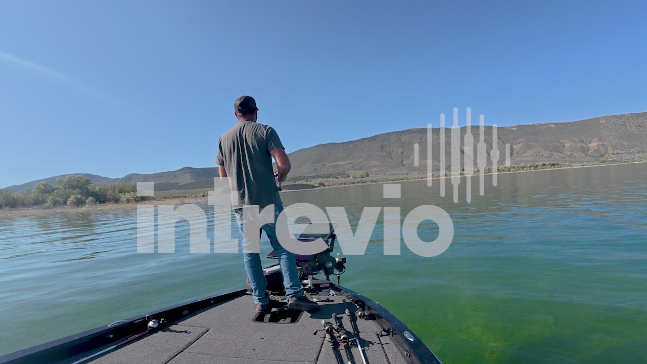 Hook Set Through Landing Smallmouth Bass Jumps Out of Water