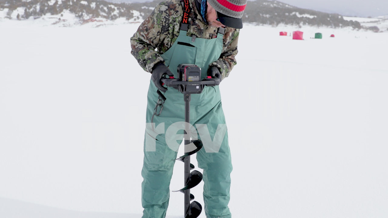 Cutting Fishing Hole in Ice With Gas Powered Ice Auger-01